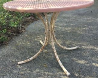 Vintage patio table with original matching umbrella.