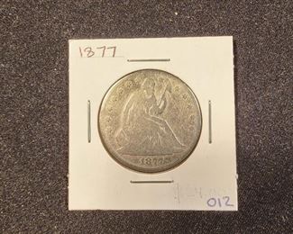 LOT 012 1877 SEATED LIBERTY HALF DOLLAR