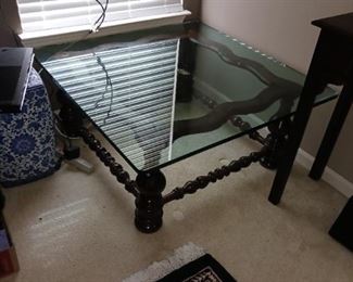 Have a thick glass coffee table