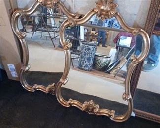 Pair of decorative Gilt gold mirrors matching