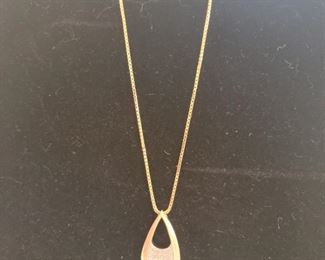 14k yellow & white gold diamond pendant. 18 in chain