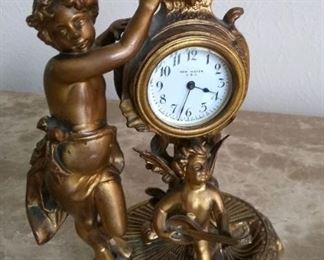 Antique New Haven gilt cherub clock