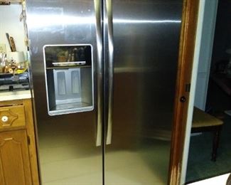 Whirlpool stainless steel 26 cu. ft. side-by-side refrigerator/freezer with ice & water dispenser.  70x36x36 