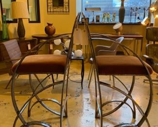 Pair of stainless steel barstools designed by and made by a California artist
