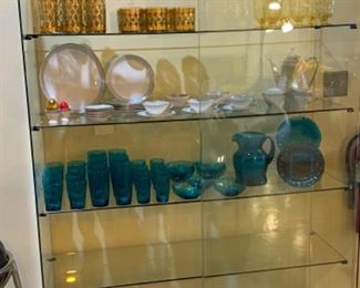 Vintage and mid century glassware and tea set. Art Deco vintage tea set is made by E.B. Lattorff made in Germany. Turquoise vintage glassware is crinkle peacock blue tumblers. 