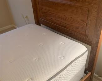 2110-3  $600  Oak Twin Bed with Manor Place Posturepedic Mattress + Boxspring	.  Measurements		42.5w 80L, 44.5h headboard.   Clean, smoke and pet free home.
