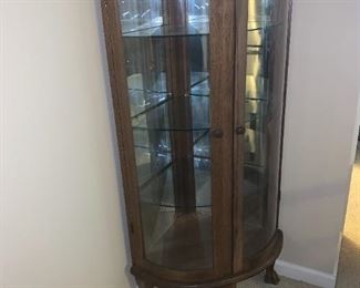2110-5    NOW $450 Antique Rounded Curio Corner Cabinet with Claw Feet, Oak.  3 glass shelves. Measurements 20d 58h