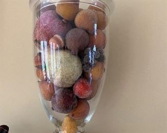 Pair of glass urns with brass stands