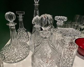 Collection of crystal and cur glass decanters