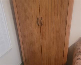 Tall, wooden cabinet