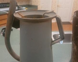 Very old oil dispenser with flexible spout