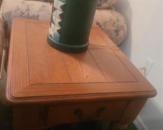One of two end tables that match the coffee table
