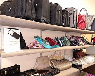 Large selection of luggage and purses. Vera Bradley purses