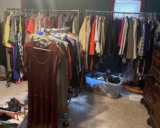 Bedroom full of women’s clothes