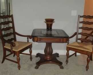 Game table with pair of country French ladder back chairs