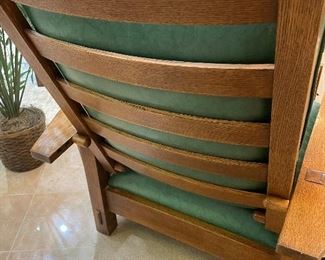 This Stickley chair has four adjustment settings.  The bars on each side of the arm rests adjust to your most comfortable position.  