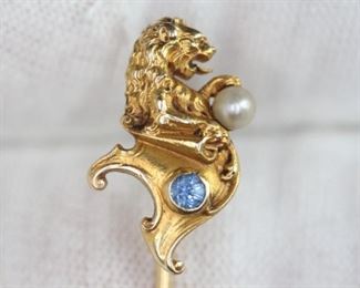 LION STICK PIN SAPPHIRE 14K YELLOW GOLD GARGOYLE VICTORIAN PEARL 2.16 GRAMS

https://www.liveauctioneers.com/item/148024998_lion-stick-pin-sapphire-14k-yellow-gold-gargoyle-victorian-pearl-216-grams
