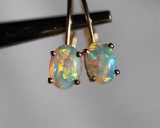OPAL EARRINGS 14K GOLD NATURAL AUSTRALIAN CRYSTAL

https://www.liveauctioneers.com/item/147048338_opal-earrings-14k-gold-natural-australian-crystal