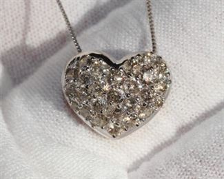 DIAMOND HEART PENDANT NECKLACE 18K GOLD D1.00ctw

https://www.liveauctioneers.com/item/147048320_diamond-heart-pendant-necklace-18k-gold-d100ctw