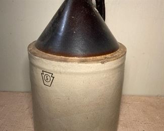 Brown and white crock  5 gal jug