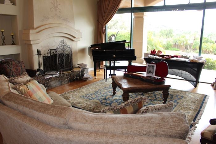 The Living Room with Yamaha Grand Baby Piano, Oriental Rug, Travertine Coffee Table