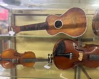 Ukulele, 1/4 model violin, violins- a couple Antonio Stradivarius violins