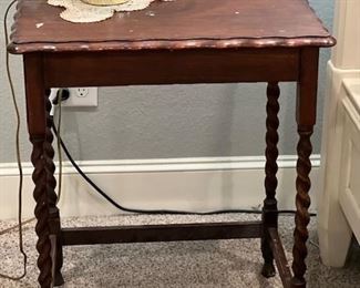 We have two matching barley twist tables.  Beautiful detailing edge. Sturdy. Antique Dark Mahogany Barley Twist Side Table
A lovely antique early 20th century mahogany side table with barley twist legs.
In good vintage condition for its age with some signs of life on the top, as pictured.
Height: 29”
Rectangular top: 23” x 17”     $150 each
