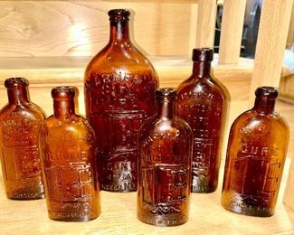 Antique Warner's Safe Cure Remedies amber glass bottles including a rare Nervine bottle and a very rare Safe Tonic Bitters bottle  (some are SOLD)