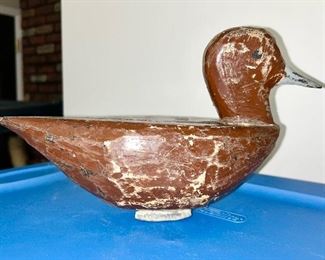 Primitive carved duck decoy with weight
