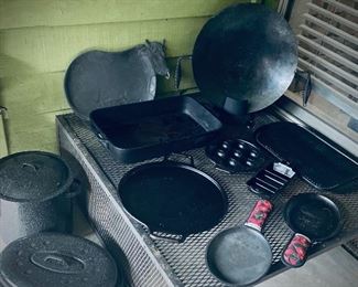 Cast iron to keep your cast iron in. 
Cast Iron for Days..  big CI, & little CI. 
Your CI & my CI. :)