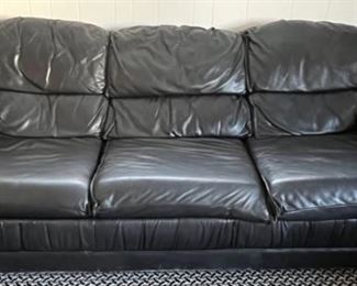 53. Black Leather Sleeper Sofa (84" x 35" x 32") (as is)