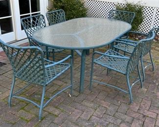 35. Brown Jordan Tempered Glass Oval Dining Table (71" x 41" x 27") and 6 Arm Chairs (as is)