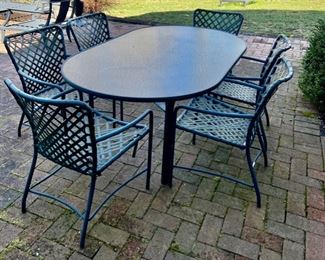 35. Brown Jordan Tempered Glass Oval Dining Table (71" x 41" x 27") and 6 Arm Chairs (as is)