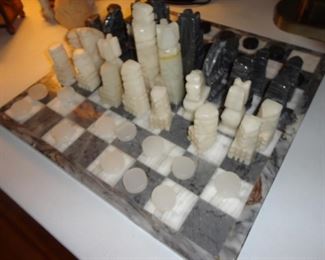 Hunted around and found this many pieces. I don't know a thing about chess so you check it out and see if they are all there.