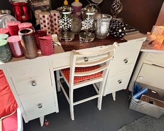 Desk with chair, large assortment of candles and candleholders