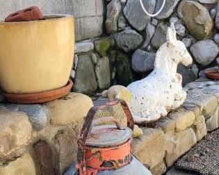 old metal jug, concrete donkey SOLD