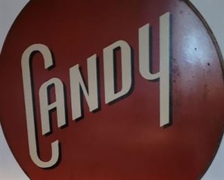 Vintage round metal "CANDY" sign