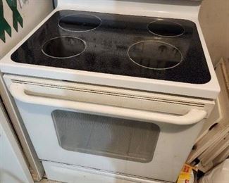Electric range with digital controls. Needs deep cleaning