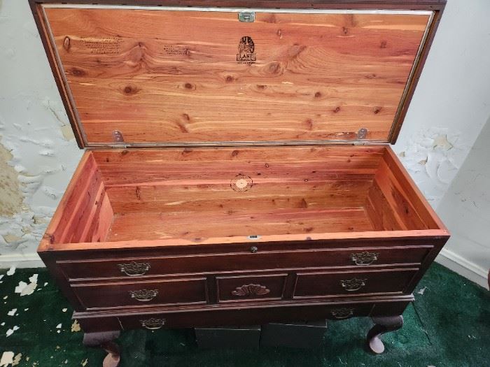 Cedar chest. Best of the lot.  Hutch that doubles as sealed cedar chest. Smells like it just came off showroom floor. Bottom drawer opens.
