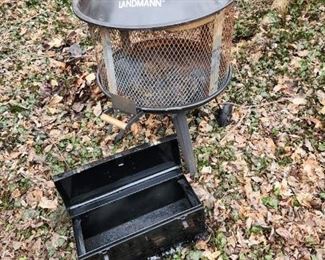 Wood fire pit.
Rusty old Craftsman tool box I painted black, $2