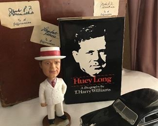 The original case of Jack PF Gremillion. Huey P. Long Bobbleheads, book and car.