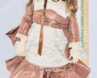 Antique jointed body porcelain head doll with an 8 on the neck