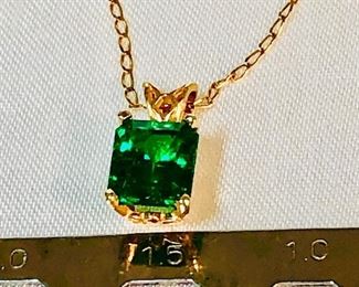 Emerald pendant on Gold necklace 