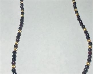 Garnet Beads and 14K gold corrugated beads Long necklace 