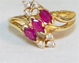 14K Gold Marquis shaped Rubies and Diamond ring 