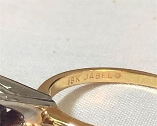  18K Gold Jabel Solitaire Garnet ring 
Look this up 