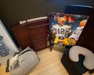 Packer poster mounted, ottoman and neck pillow