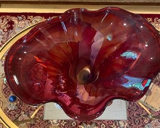 Top view of red vessel signed art glass