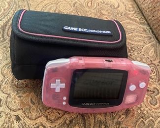 Pink Game Boy Advance with case