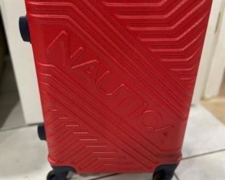 Red Nautica 4 spinner wheel suitcase, was $44, NOW $29